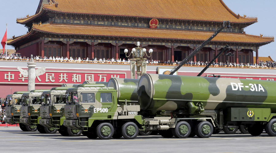 Military vehicles carrying DF-31A long-range missiles drive past the Tiananmen Gate during a military parade to mark the 70th anniversary of the end of World War Two, in Beijing, China, September 3, 2015. REUTERS/Jason Lee - RTX1QTYV